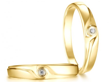Nhẫn cưới vàng đính kim cương hoa văn lượn sóng